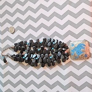 Turquoise and black stone Bronc necklace